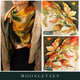 Reversible silk scarf collage showing a neck styling and contrasting floral patterns labelled Side A and Side B.