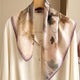 Cream and brown leaf-print silk neckerchief with purple lace trim draped over a white shirt.